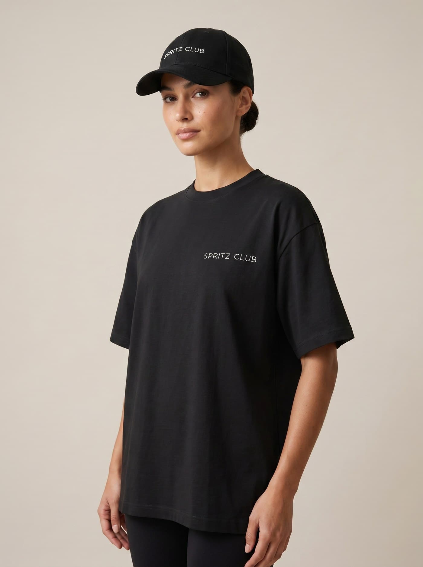 Spritz Club cap on a model, studio